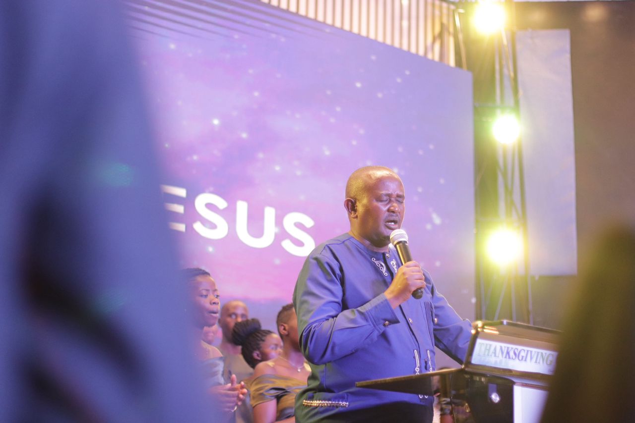 Revival Palace Community Church leadership team and congregation